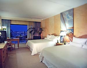 Deluxe double and 2 children with sea view, queen bed, and private facilities